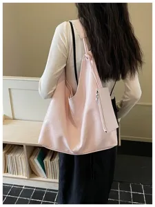 Detailed view of a stylish pink large capacity shoulder tote bag for women daily commute.