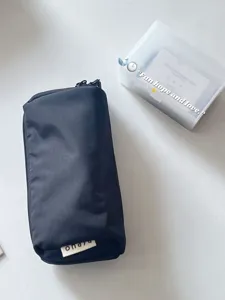 Black minimalist pencil case, large capacity stationery storage pouch for daily office use.