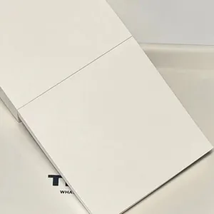 Close-up detail view of thick white sticky notes memo pad for daily study and writing.