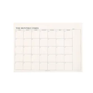 Minimalist monthly calendar planner notepad detail, great for study and office organization.