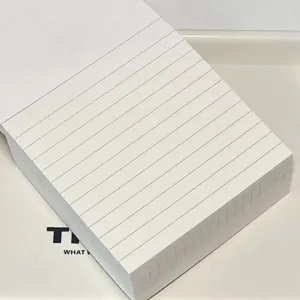 Detailed view of thick sticky notes with lined pages for student study and memo taking.