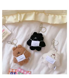 Cute plush bear keychain with mask, ins style soft bag pendant, sweet cartoon couple doll accessory.