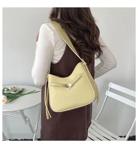 Korean style retro yellow shoulder bag, PU leather bucket bag, versatile crossbody bag for women.
