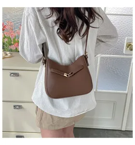 Retro brown shoulder bag for women, versatile PU leather crossbody bag with metal lock design.