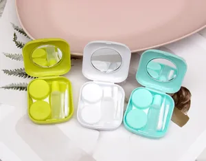 Compact portable contact lens case set with mirror, tweezers, and solution bottle details.