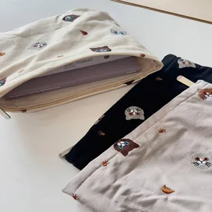 Cute cat embroidered canvas makeup pouch, Japanese style aesthetic portable cosmetic zip bag.
