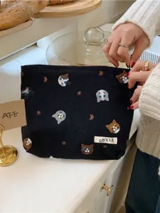 Cute cat embroidered canvas makeup bag, black portable cosmetic pouch for daily use.