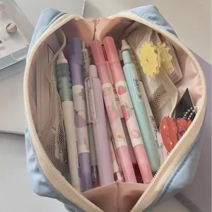 Aesthetic light blue pencil case, cute square stationery pouch for school supplies.