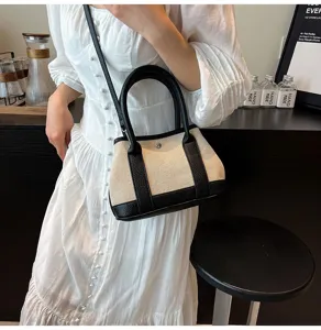 Chic two-tone canvas leather crossbody handbag, stylish casual women tote bag for summer.