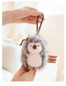 Cute hedgehog plush keychain and bag charm, soft stuffed animal pendant with woven strap.