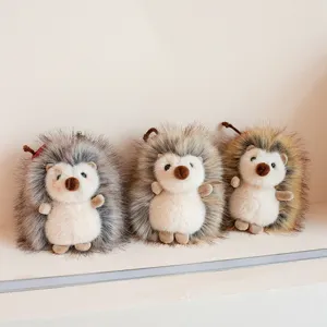 Cute fluffy hedgehog plush keychain toy main view display showing three adorable animal dolls.