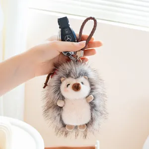 Cute hedgehog plush keychain for car keys and bags, soft stuffed animal charm pendant accessory.