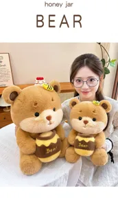 Cute bee bear plush toy hugging honey jar, soft teddy doll for kids birthday gift.