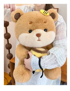 Detailed view of cute honey bear plush toy holding pot, soft material and exquisite details.