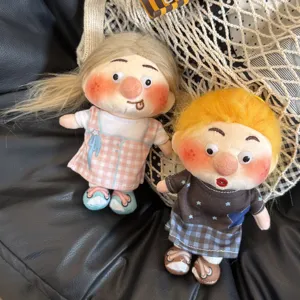 Cute curly hair freckles plush doll pendant keychain, fluffy stuffed toy bag charm accessory.