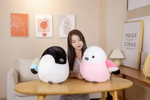 Detailed view of cute fat bird plush toy, soft stuffed animal pillow for kids and home decor.
