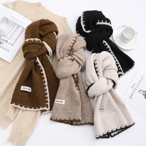 Winter warm knitted scarf for women, cozy wool blend thick neckerchief, stylish versatile design.