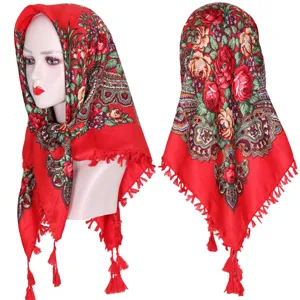 Red floral print headscarf with traditional ethnic style and delicate tassels for women.