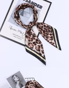 Classic leopard print silk scarf for women, elegant black and gold border neckerchief accessory.