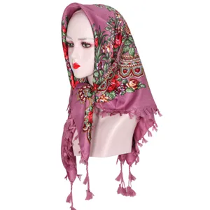 Detailed view of the floral pattern cotton headscarf, Central Asian ethnic style with tassels.