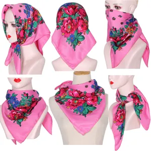 Detail view of pink floral square scarf featuring traditional Russian ethnic style patterns, soft cotton.