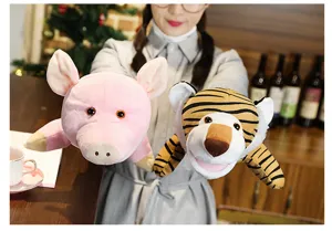 Detailed shot of cute plush animal hand puppets, soft fabric design for kids storytelling.