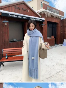 Fluffy winter scarf for women, thick warm imitation rabbit fur tassel design in solid blue.