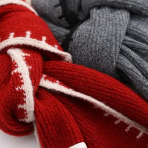 Cozy knitted winter scarf for women, warm chunky neck warmer in red and grey, stylish fashion accessory.