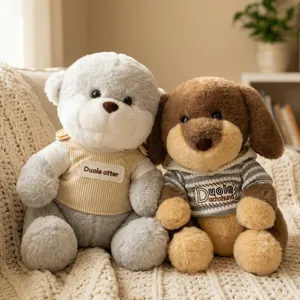 Cute plush toy set featuring a sitting otter and dog in cozy sweaters, perfect kids gift.