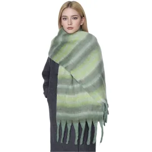Green striped winter scarf detail, soft warm knit material with elegant fringe design.