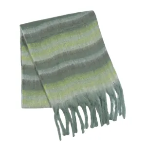 Green striped winter scarf detail, cozy knitted fabric with tassels, warm cold weather neckwear.