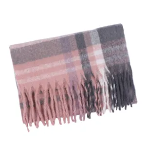 Detailed view of the pink grey plaid winter scarf, soft fringe texture and warm fabric design.