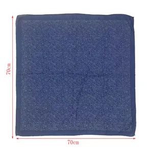 Detailed view of the dark blue rhinestone square headscarf showing dense sparkling floral pattern.