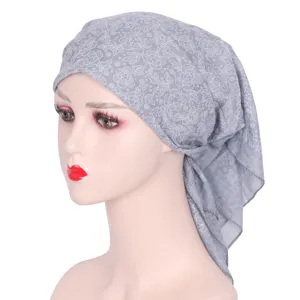 Detail closeup of the elegant grey rhinestone floral headscarf fabric design for women.