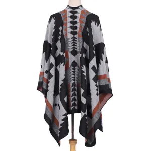 Geometric knit poncho shawl for women, cozy winter warm cape cloak with open front design.