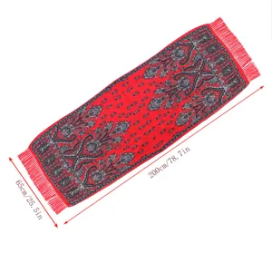 Detail view of the red boho paisley print tassel scarf with clear dimension display.