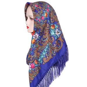 Detailed view of the blue ethnic floral print headscarf featuring exquisite patterns.