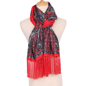 Detailed view of the ethnic style printed tassel scarf, elegant red and black design for women.