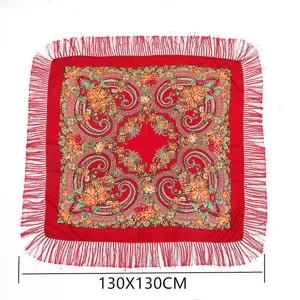 Detailed view of the traditional Russian floral paisley square shawl with delicate fringe.