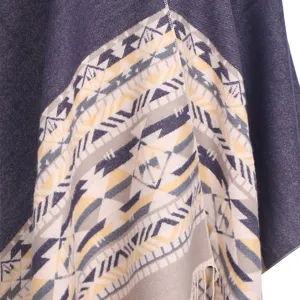 Women geometric print warm cashmere-feel tassel poncho shawl detail view winter fashion