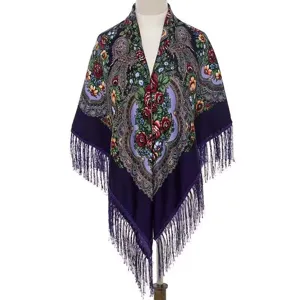 Detailed view of traditional Russian style floral printed fringe shawl in dark purple.