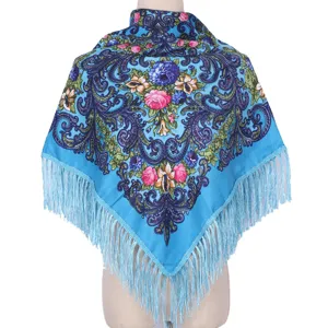 Detailed view of women retro floral square scarf with fringe, ethnic vintage warm winter shawl.