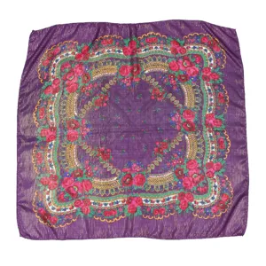 Detail view of a vintage purple square headscarf featuring metallic gold threads and floral roses.