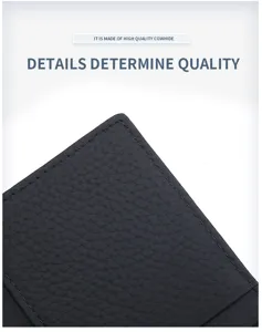 Close-up detail view of black genuine leather card holder, showing premium fine stitching texture.