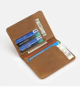 Brown crazy horse leather passport holder wallet travel document organizer with card slots.