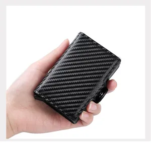 Men carbon fiber texture automatic pop-up card holder wallet detail view for everyday use.