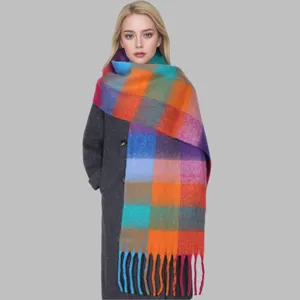 Detailed view of the colorful plaid tassel scarf showcasing vibrant color blocks.