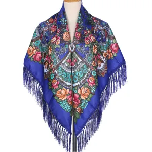 Detailed view of the blue floral print shawl with elegant fringe and traditional pattern.