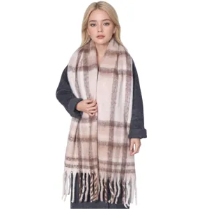 Cozy thick plaid tassel scarf detail, warm winter fringe shawl accessory for women.