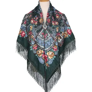 Detailed view of dark green floral shawl with fringe, ethnic vintage style scarf for women.